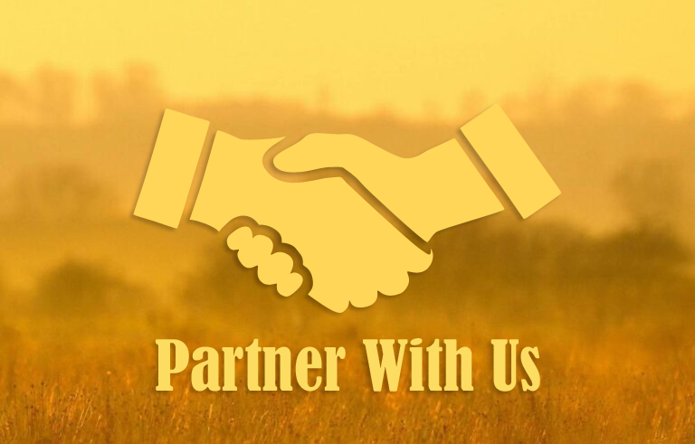 Partner with us - hands shaking in front of a wheat field